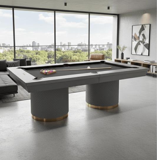 Sienna modern slate pool table in gray with twin drum legs in a city-view living room