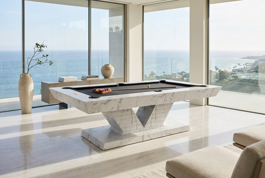 White Billiards Royal modern slate pool table in white marble with a sculpted V-base in an ocean-view villa